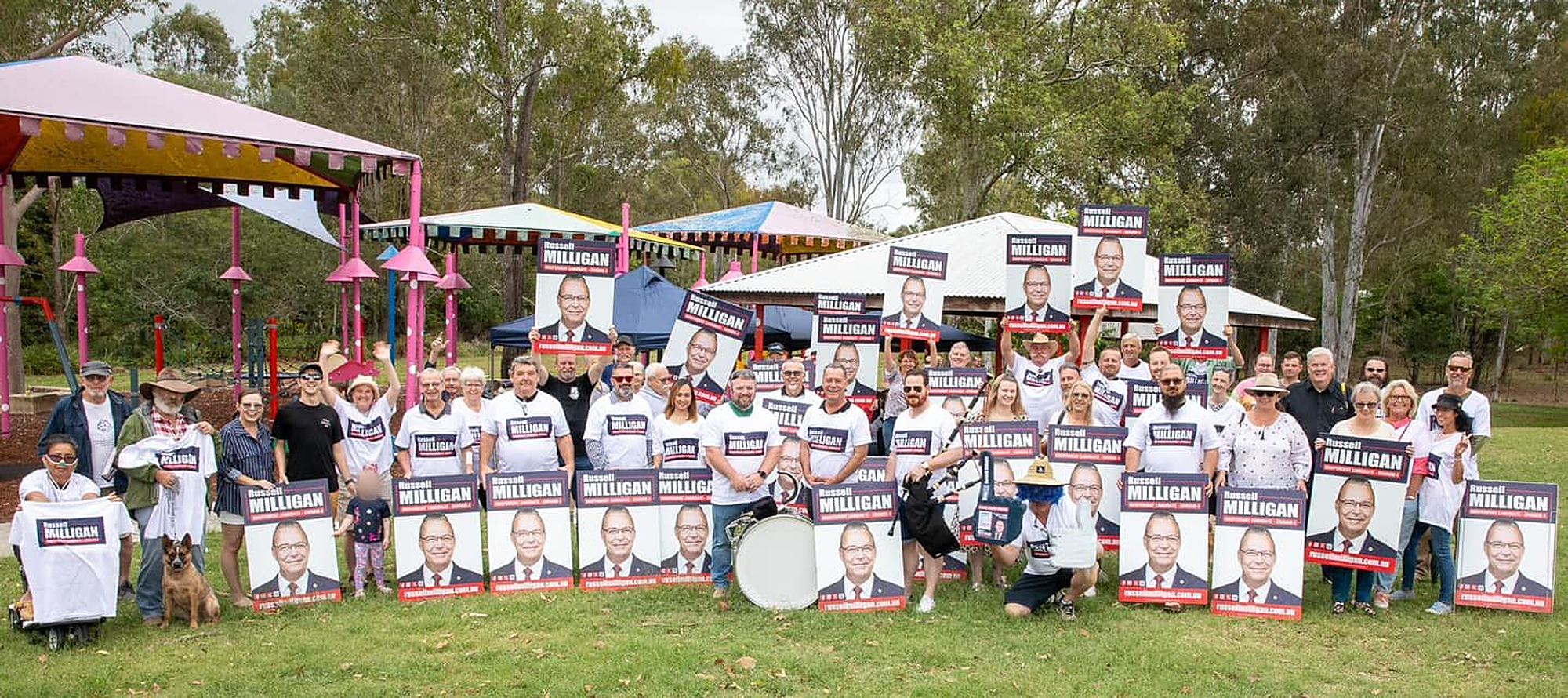 Cr Russell Milligan's campaign team with corflutes, Ipswich